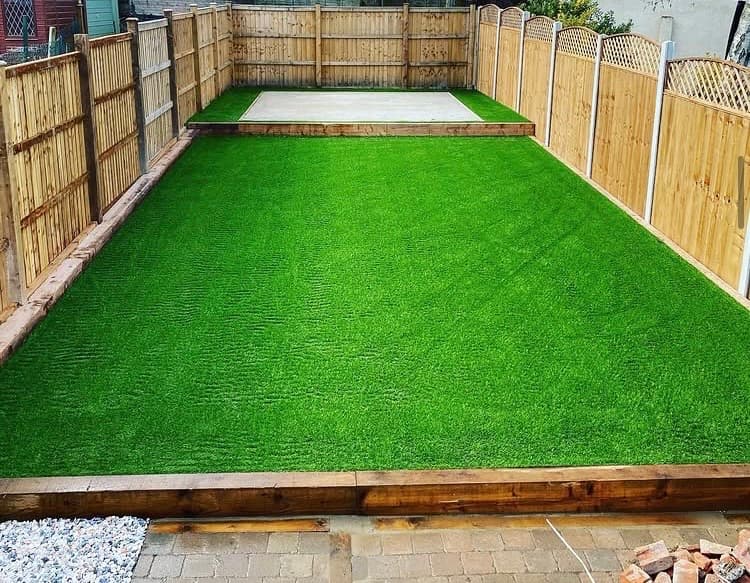 Completed Billericay garden with new fencing, artificial grass and seating area